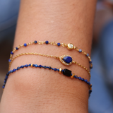 Duo bracelet of stones and golden discs