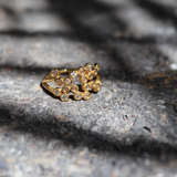 Gold ring with zircons