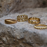 Domed ribbed gold ring