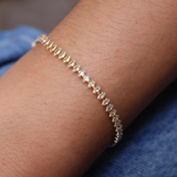 Gold tennis bracelet with zircons