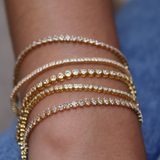 Gold tennis bracelet with 2.5mm zircons