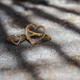 Small hollow heart and zircons gold ring