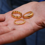 Domed ribbed gold ring