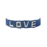 Bracelet brésilien doré fil tissé bleu marine et crème "love"