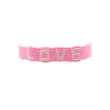 Bracelet brésilien doré fil tissé rose et crème "love"