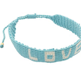 Bracelet brésilien doré fil tissé bleu et crème "love"