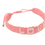 Bracelet brésilien doré fil tissé corail et crème "love"