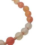 Collier doré perles orange et blanches alternées à des noeuds orange 64 cm
