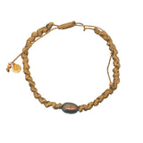 Bracelet cordon doré et perle de culture grise