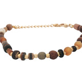 Bracelet doré mix de perles en bois, dorées et fantaisie