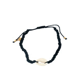 Bracelet doré cordon bleu marine cauri naturel