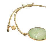 Bracelet sur cordon doré prehnite facettée ovale