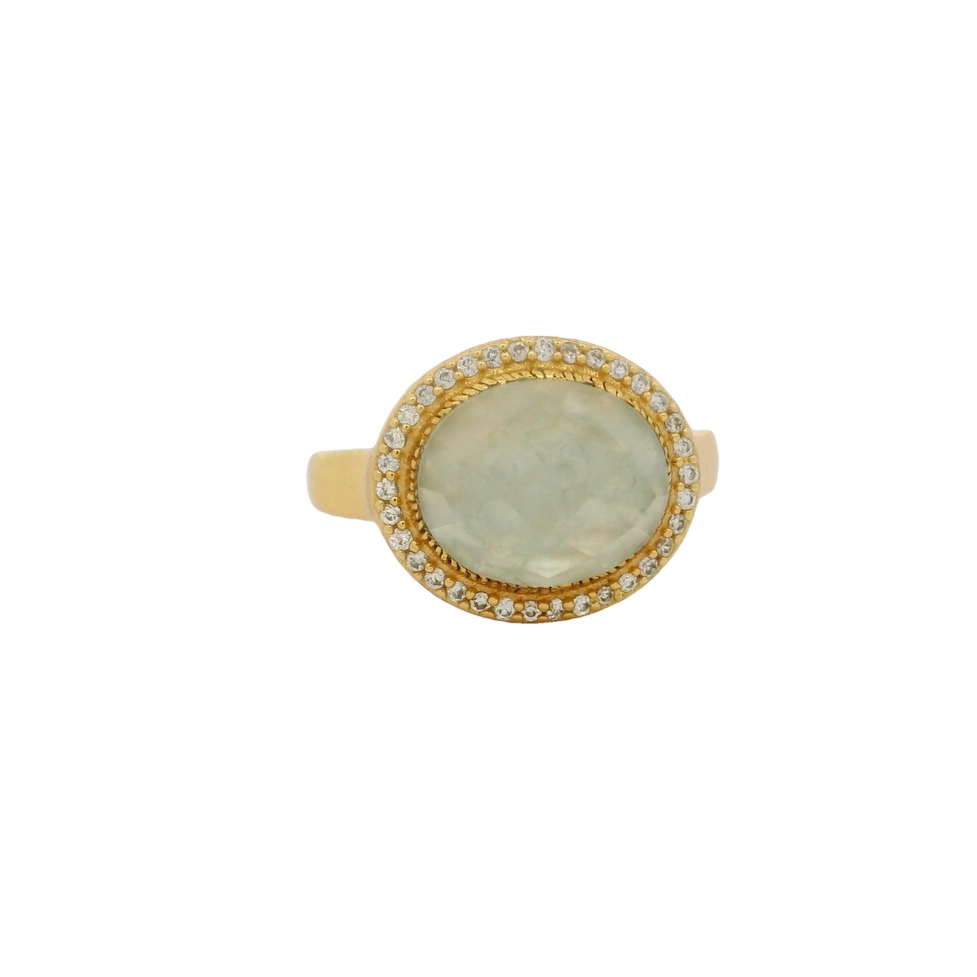 Golden ring with faceted oval stone and zircons