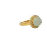 Bague dorée pierre ovale facettée et zircons