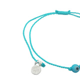 Bracelet argent 925 cordon fin et petit oeil turquoise