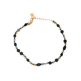 Bracelet doré mix perles noires et couronnes dorées