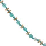 Collier doré perles turquoises, couronnes dorées et noeuds turquoises 75cm