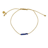 Braided gold bracelet with small stones