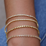 Gold tennis bracelet with 2mm zircons