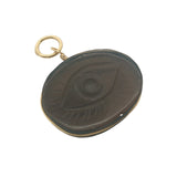 Charms doré oeil gravé sur médaille en quartz fumé avec fil doré