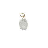 Charms doré tortue taillée dans du cristal blanc