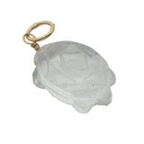 Charms doré tortue taillée dans du cristal blanc