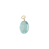 Charms doré coquillage taillé dans de la topaze bleue avec fil doré