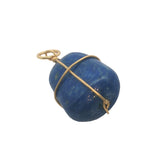 Charms doré lapis lazulis entourée d'un fil doré