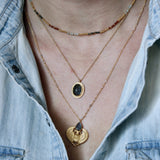 Gold necklace with lapis scarab pendant