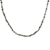 Collier doré disques de coquillages teintés et noeuds beiges 64 cm