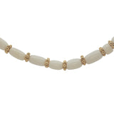 Collier doré perle en os et couronnes dorées 75 cm