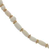 Collier doré perle en os et couronnes dorées 75 cm