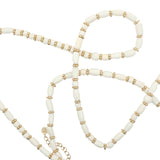 Collier doré perle en os et couronnes dorées 75 cm