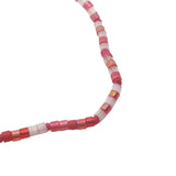 Collier doré avec perles Miyuki rouges et roses 38 cm