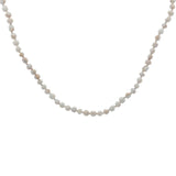 Collier doré perles blanches marbrées roses avec noeuds blancs 75 cm