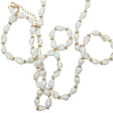Collier doré coquillages et couronnes dorées 75 cm