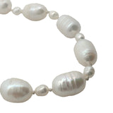 Collier doré alternance petites et grandes perles de culture avec noeuds blancs 60 cm