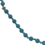 Collier doré perles turquoise, disques dorés et noeuds turquoise 42 cm