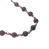 Collier doré perles violines et dorées avec noeuds violets 42 cm