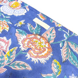 Grande pochette de voyage bleu marine à fleurs oranges et blanches