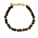 Bracelet doré avec perles de bois et disques dorés