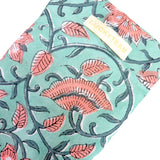 Pochette à bijoux verte et bleue à fleurs roses