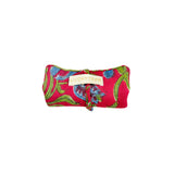 Red jewelry pouch with blue flowers and green interior