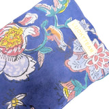 Pochette à bijoux bleu marine à fleurs blanches et oranges