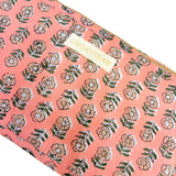 Petite pochette corail à fleurs jaunes