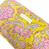 Yellow pouch with pink and white flowers