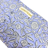 Petite pochette lilas à fleurs blanches