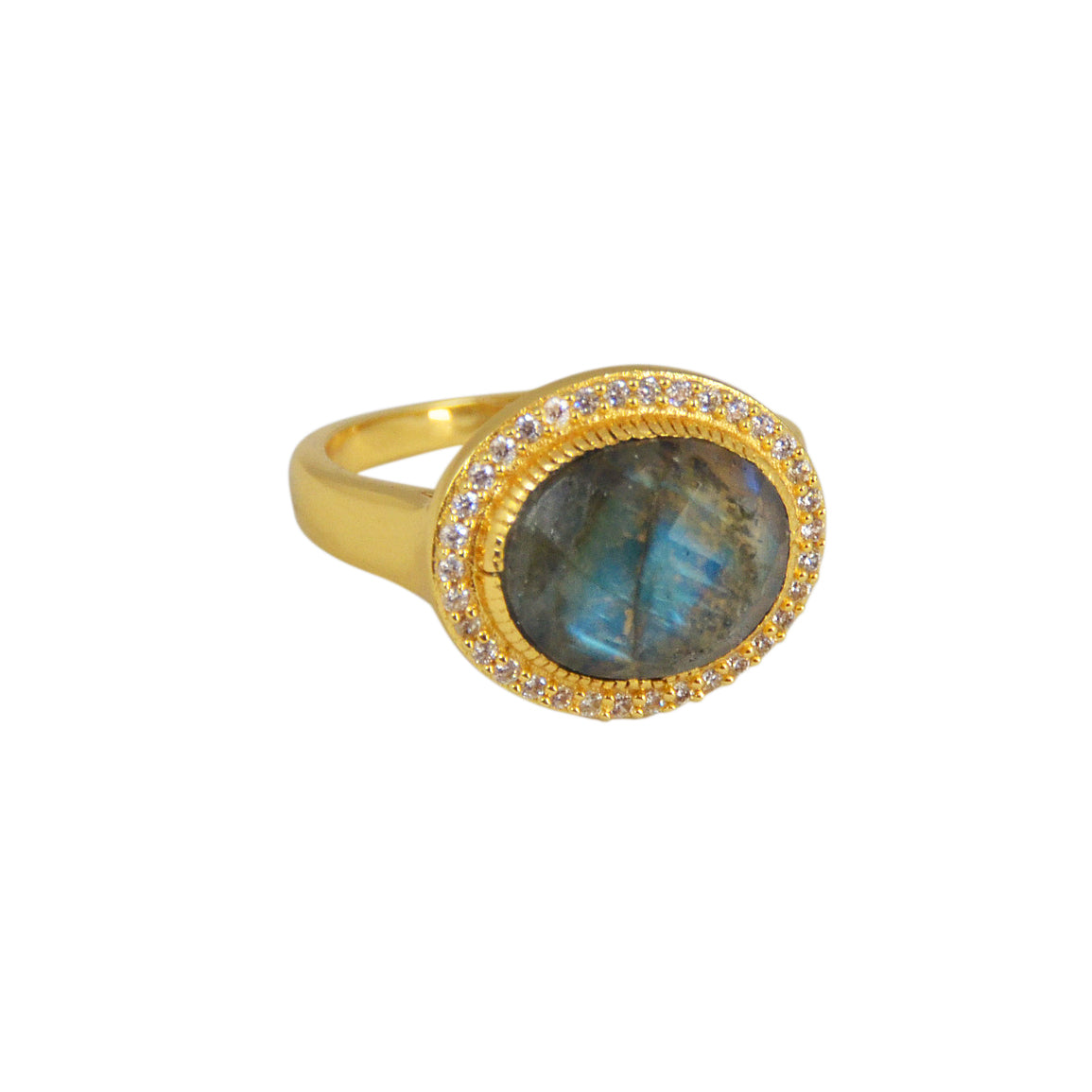 Bague dorée pierre ovale facettée et zircons