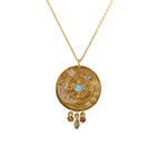 Collier doré médaille astres pierres et zircons -