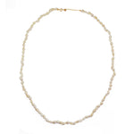 Collier doré et coquillages
